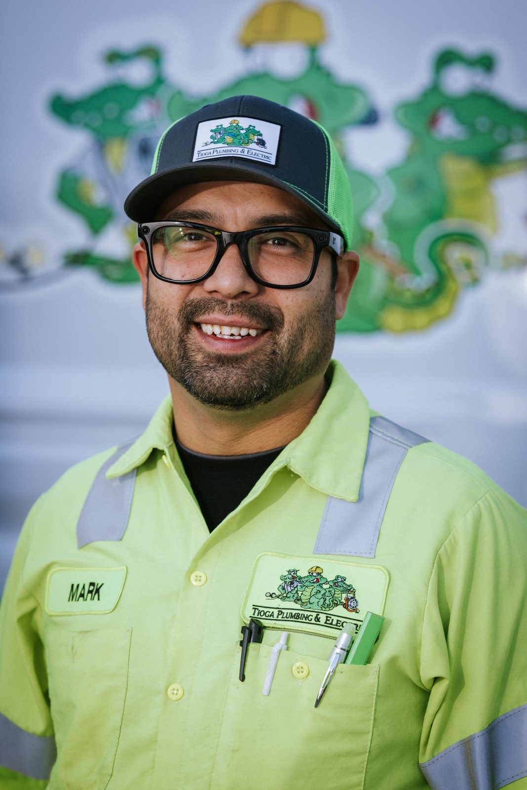 Tioga Plumbing technician Mark, portrait in front of the gator van