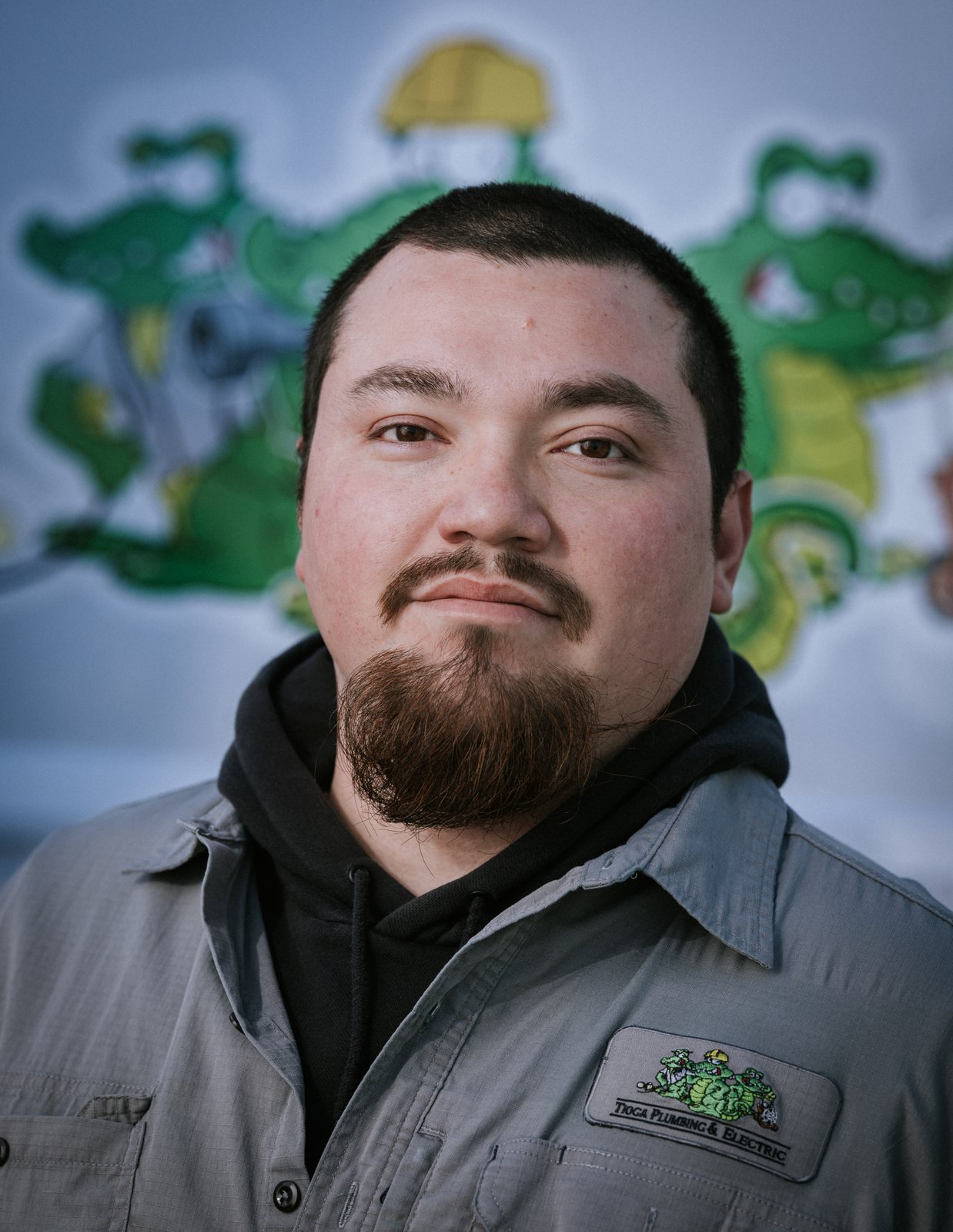Tioga Plumbing technician portrait in front of the gator van