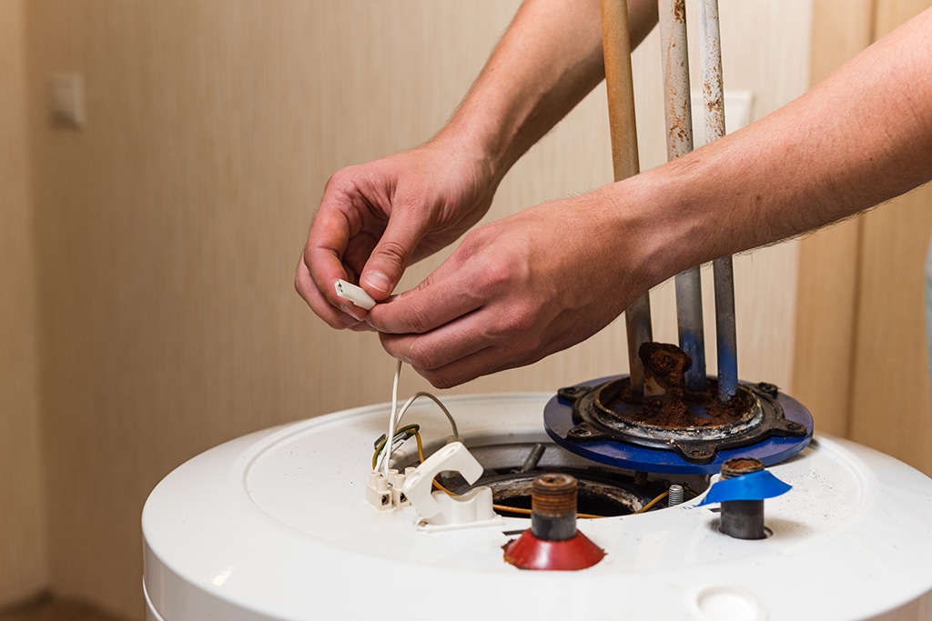 When To Call An Electrician Instead Of A Plumber For Water Heater Repair | Flower Mound, TX