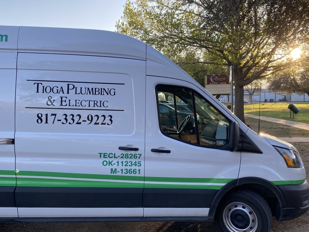 A Tioga Plumbing & Electric service van at the Hulen Park in Cleburne Texas