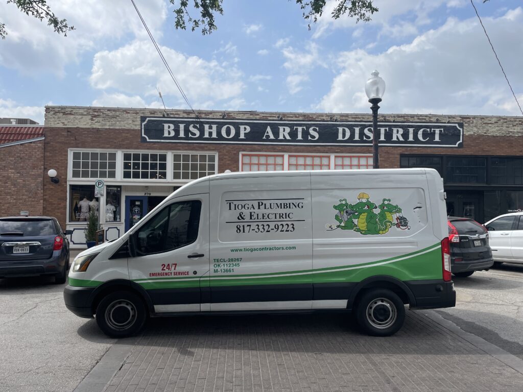 A Tioga Plumbing & Electric service vehicle in the Bishop Arts District in Dallas Texas